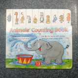 Animals' Counting Book - One baby elephant Has some bathtime fun . He fills his trunk with water And showers everyone