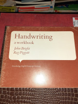 Handwriting a workbook.